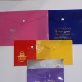 خدمات چاپ طلاکوب پوشه دکمه دار طلقی و پارچه ای با چاپ طلاکوب کرج