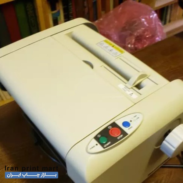 دستگاه تاکن برقی