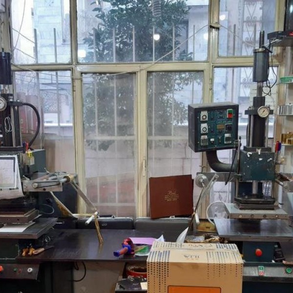 خدمات چاپ طلاکوب پوشه دکمه دار طلقی و پارچه ای با چاپ طلاکوب کرج