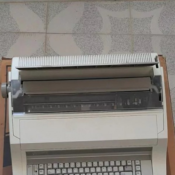 دستگاه تایپ دستی